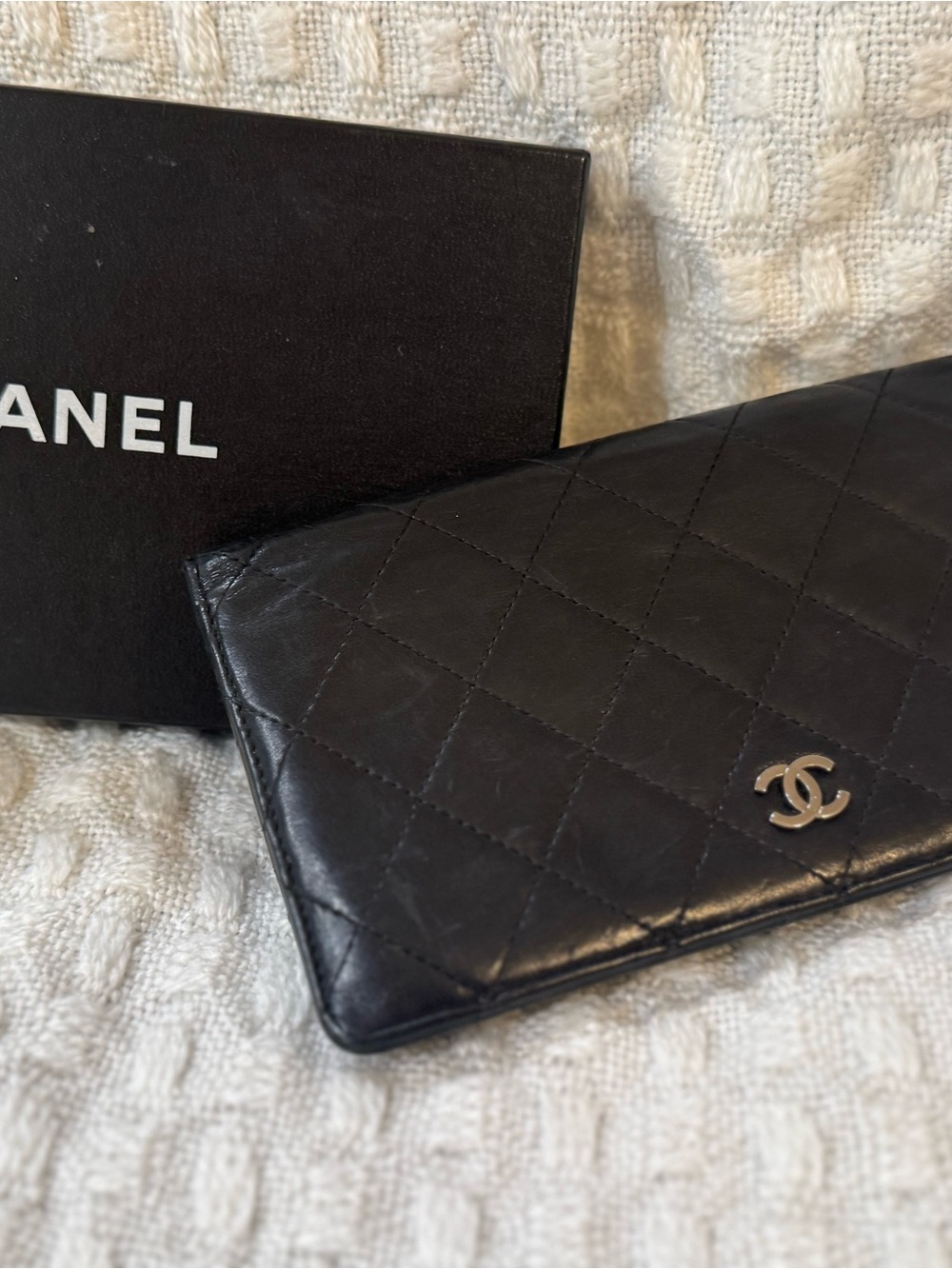 CHANEL Black Quilted Leather Wallet with Silver CC Emblem